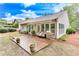 Backyard patio with outdoor grill and space for outdoor furniture at 4460 Delano Dr, Cumming, GA 30040
