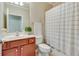 Bathroom featuring a vanity with great storage and shower over bath at 4460 Delano Dr, Cumming, GA 30040