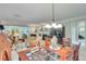 Comfortable living space with a fireplace, view to the back patio, and bright, open layout at 4460 Delano Dr, Cumming, GA 30040