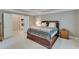Spacious main bedroom features a trey ceiling, neutral carpet, and an ensuite bathroom that promises comfort and relaxation at 4460 Delano Dr, Cumming, GA 30040