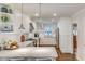 Modern kitchen with white cabinets, stainless steel appliances, and marble countertops, offering a clean and functional space at 1343 Peachtree Battle Nw Ave, Atlanta, GA 30327