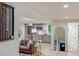 Inviting living room provides access to a kitchenette, a small dart board game, and access to the staircase at 1343 Peachtree Battle Nw Ave, Atlanta, GA 30327