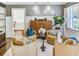 Stylish living room with four comfortable chairs, a small table, modern light fixtures and decor creating a cozy atmosphere at 1343 Peachtree Battle Nw Ave, Atlanta, GA 30327
