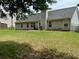 Large, grassy backyard with a mix of sun and shade, perfect for recreation at 19 Windcrest Dr, Covington, GA 30016