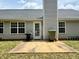 Outdoor patio with a grill and direct access to the house and backyard at 19 Windcrest Dr, Covington, GA 30016