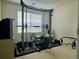Basement home gym with weight training equipment and bright natural light at 19 Windcrest Dr, Covington, GA 30016