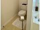 Practical bathroom layout featuring a toilet and a sink, maximizing space and functionality at 19 Windcrest Dr, Covington, GA 30016