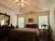 Bright bedroom with windows, showcasing a comfortable bed and plenty of space at 19 Windcrest Dr, Covington, GA 30016