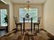 Cozy dining area featuring a modern table set, perfect for intimate meals at 19 Windcrest Dr, Covington, GA 30016