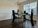 Stylish dining room featuring a modern table setting, elegant chairs, and warm lighting, ideal for gatherings at 19 Windcrest Dr, Covington, GA 30016