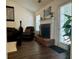 Inviting living room with a cozy fireplace and lots of natural light at 19 Windcrest Dr, Covington, GA 30016