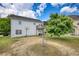 Large backyard featuring a deck, grass and a basketball hoop for outdoor activities at 2000 Redwood Trce, Ellenwood, GA 30294
