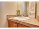 Bathroom vanity features a white sink with a decorative sign, and decorative knobs at 2000 Redwood Trce, Ellenwood, GA 30294