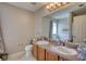 Spacious bathroom features dual sinks, a large mirror, and plenty of counter space and storage at 2000 Redwood Trce, Ellenwood, GA 30294