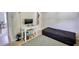 A bedroom provides a desk area, carpeted floors, and natural light at 2000 Redwood Trce, Ellenwood, GA 30294