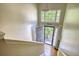 A bright foyer is enhanced by a decorative transom window above the home's entry door at 2000 Redwood Trce, Ellenwood, GA 30294