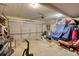 A spacious garage features a large door, high ceilings, and ample space at 2000 Redwood Trce, Ellenwood, GA 30294