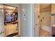 This hallway provides access to a basement and a bathroom in the home at 2000 Redwood Trce, Ellenwood, GA 30294