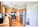 Well-equipped kitchen featuring stainless steel appliances and ample cabinet space for storage at 2000 Redwood Trce, Ellenwood, GA 30294