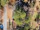 Overhead aerial view of mature trees covering the home and landscaping in the front yard at 2814 Lloyd Rd, Decatur, GA 30034