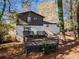 Spacious wooden deck, perfect for entertaining, overlooks the private, wooded backyard at 2814 Lloyd Rd, Decatur, GA 30034