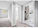 Hallway with a modern bathroom with tile floors and marble shower at 2814 Lloyd Rd, Decatur, GA 30034