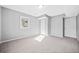 Finished basement bedroom with neutral carpet, light gray walls and windows for natural light at 2814 Lloyd Rd, Decatur, GA 30034