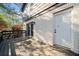 View of backyard deck featuring access to home via white door and sliding glass door at 2814 Lloyd Rd, Decatur, GA 30034