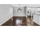 Bright dining area with stainless steel appliances and hardwood floors, creating a functional living space at 2814 Lloyd Rd, Decatur, GA 30034