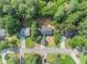 Aerial view shows home's roof, driveway and proximity to other neighborhood homes at 5346 Kelleys Mill Cir, Stone Mountain, GA 30088