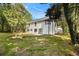 Backyard view showing a large lawn and treed perimeter for privacy at 5346 Kelleys Mill Cir, Stone Mountain, GA 30088
