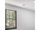 This bedroom features natural light from the window and has neutral wall-to-wall carpet at 5346 Kelleys Mill Cir, Stone Mountain, GA 30088