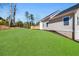 Expansive backyard with lush green lawn and exterior view of house at 939 Whistler Ln, Canton, GA 30114