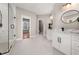A modern bathroom featuring a glass enclosed shower with a vanity and sink at 939 Whistler Ln, Canton, GA 30114