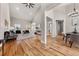 Spacious open-concept living room with vaulted ceiling, abundant natural light, and hardwood floors, perfect for entertaining at 939 Whistler Ln, Canton, GA 30114