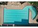 Aerial view of a large six-lane lap pool surrounded by chairs and tables at 940 River Valley Dr, Dacula, GA 30019