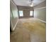 Large bedroom with two windows, vaulted ceilings, and carpeted floors at 940 River Valley Dr, Dacula, GA 30019