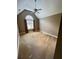 Neutral bedroom with large windows, tan walls, and a ceiling fan at 940 River Valley Dr, Dacula, GA 30019