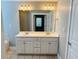 Bathroom features double sinks, modern lighting, and ample counter space at 1714 Boulder Walk Se Ln, Atlanta, GA 30316
