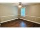 Bedroom featuring wood floors, natural light, and neutral paint at 1714 Boulder Walk Se Ln, Atlanta, GA 30316
