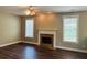 Spacious living room featuring a fireplace, wood floors, and ample natural light at 1714 Boulder Walk Se Ln, Atlanta, GA 30316