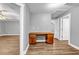 Versatile room with wood floors and an antique desk at 1714 Boulder Walk Se Ln, Atlanta, GA 30316