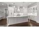Modern kitchen featuring white cabinetry, a large center island, and stainless steel appliances at 1898 Walker Ave, College Park, GA 30337