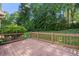 Wooden deck offers great space for outdoor living overlooking the serene backyard of this home at 227 Eton Ct, Mableton, GA 30126
