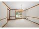 Bright dining room with chandelier, carpet and large window at 227 Eton Ct, Mableton, GA 30126