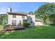 Lovely backyard view of this home featuring a deck, green lawn, and beautiful siding at 227 Eton Ct, Mableton, GA 30126