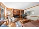 Cozy living room with built-in bookshelves, fireplace, and hardwood floors at 227 Eton Ct, Mableton, GA 30126