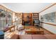 Cozy living room with built-in bookshelves, fireplace, and hardwood floors at 227 Eton Ct, Mableton, GA 30126