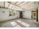Unfinished basement featuring concrete floor and natural light at 474 Upper Burris Rd, Canton, GA 30114