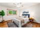 Bedroom with hardwood floors, and a cozy rug at 474 Upper Burris Rd, Canton, GA 30114